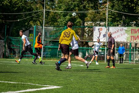 MOSCOW, RUSSIA - AUGUST 24, 2019: Soccer players in game. Amateur league in Moscow.のeditorial素材