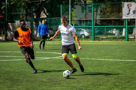 MOSCOW, RUSSIA - AUGUST 24, 2019: Soccer players in game. Amateur league in Moscow.のeditorial素材