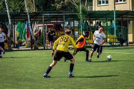 MOSCOW, RUSSIA - AUGUST 24, 2019: Soccer players in game. Amateur league in Moscow.のeditorial素材