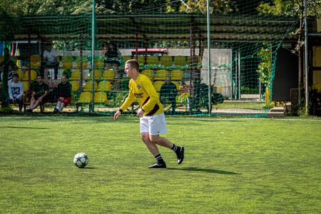 MOSCOW, RUSSIA - AUGUST 24, 2019: Soccer players in game. Amateur league in Moscow.のeditorial素材
