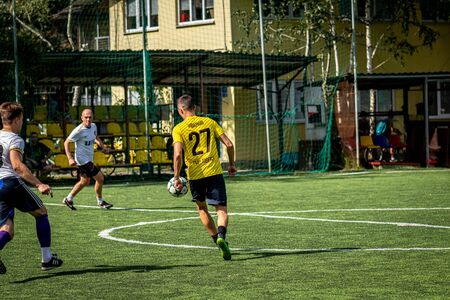 MOSCOW, RUSSIA - AUGUST 24, 2019: Soccer players in game. Amateur league in Moscow.のeditorial素材