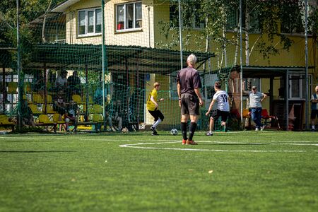 MOSCOW, RUSSIA - AUGUST 24, 2019: Soccer players in game. Amateur league in Moscow.のeditorial素材