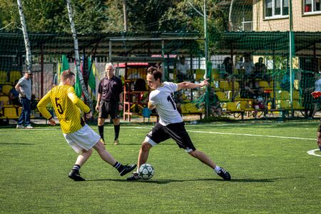 MOSCOW, RUSSIA - AUGUST 24, 2019: Soccer players in game. Amateur league in Moscow.のeditorial素材