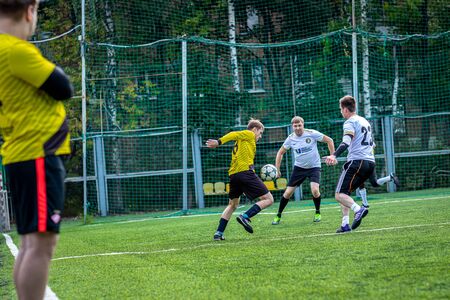 MOSCOW, RUSSIA - AUGUST 24, 2019: Soccer players in game. Amateur league in Moscow.のeditorial素材