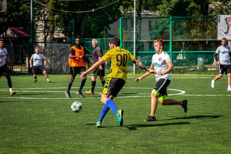 MOSCOW, RUSSIA - AUGUST 24, 2019: Soccer players in game. Amateur league in Moscow.のeditorial素材