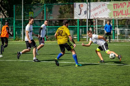MOSCOW, RUSSIA - AUGUST 24, 2019: Soccer players in game. Amateur league in Moscow.のeditorial素材