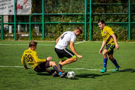 MOSCOW, RUSSIA - AUGUST 24, 2019: Soccer players in game. Amateur league in Moscow.のeditorial素材