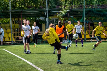 MOSCOW, RUSSIA - AUGUST 24, 2019: Soccer players in game. Amateur league in Moscow.のeditorial素材