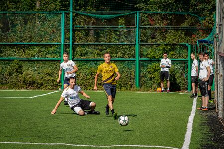 MOSCOW, RUSSIA - AUGUST 24, 2019: Soccer players in game. Amateur league in Moscow.のeditorial素材