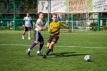 MOSCOW, RUSSIA - AUGUST 24, 2019: Soccer players in game. Amateur league in Moscow.のeditorial素材