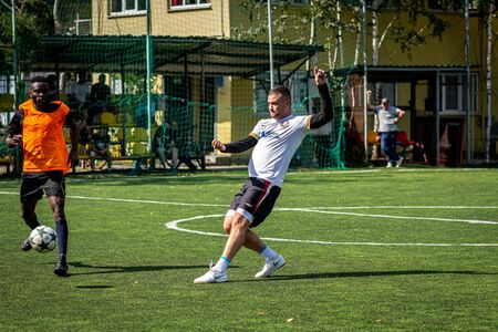 MOSCOW, RUSSIA - AUGUST 24, 2019: Soccer players in game. Amateur league in Moscow.のeditorial素材