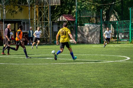 MOSCOW, RUSSIA - AUGUST 24, 2019: Soccer players in game. Amateur league in Moscow.のeditorial素材