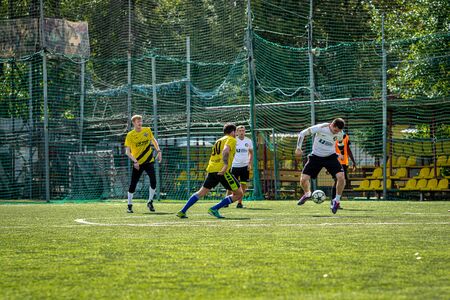 MOSCOW, RUSSIA - AUGUST 24, 2019: Soccer players in game. Amateur league in Moscow.のeditorial素材