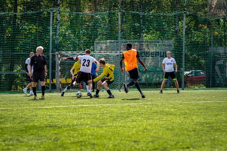 MOSCOW, RUSSIA - AUGUST 24, 2019: Soccer players in game. Amateur league in Moscow.のeditorial素材