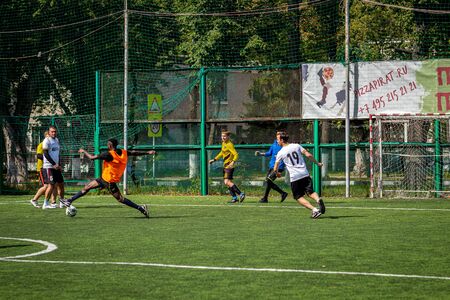 MOSCOW, RUSSIA - AUGUST 24, 2019: Soccer players in game. Amateur league in Moscow.のeditorial素材