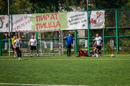 MOSCOW, RUSSIA - AUGUST 24, 2019: Soccer players in game. Amateur league in Moscow.のeditorial素材