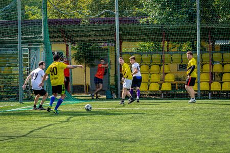 MOSCOW, RUSSIA - AUGUST 24, 2019: Soccer players in game. Amateur league in Moscow.のeditorial素材