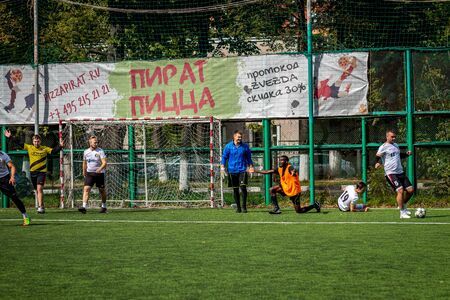 MOSCOW, RUSSIA - AUGUST 24, 2019: Soccer players in game. Amateur league in Moscow.のeditorial素材