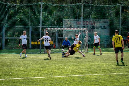MOSCOW, RUSSIA - AUGUST 24, 2019: Soccer players in game. Amateur league in Moscow.のeditorial素材