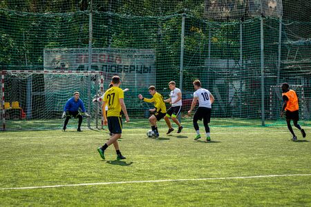 MOSCOW, RUSSIA - AUGUST 24, 2019: Soccer players in game. Amateur league in Moscow.のeditorial素材