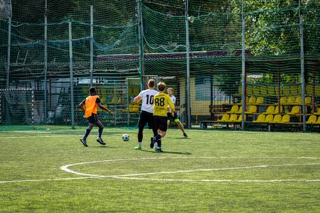 MOSCOW, RUSSIA - AUGUST 24, 2019: Soccer players in game. Amateur league in Moscow.のeditorial素材