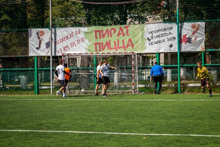 MOSCOW, RUSSIA - AUGUST 24, 2019: Soccer players in game. Amateur league in Moscow.のeditorial素材