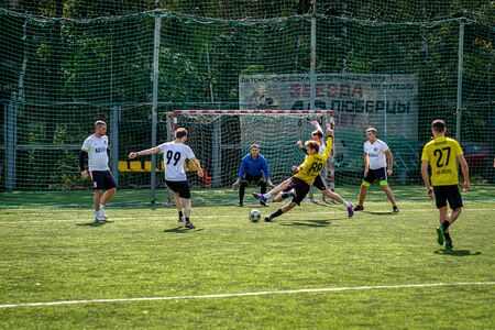 MOSCOW, RUSSIA - AUGUST 24, 2019: Soccer players in game. Amateur league in Moscow.のeditorial素材