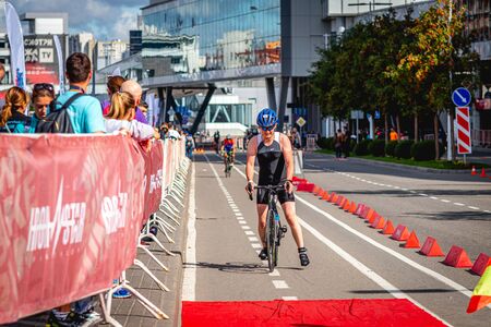 MOSCOW, RUSSIA - AUGUST 25, 2019: Ironman Cycling competition, cyclist athletes riding a race. Ironstar Crocus Fitness Triathlon.のeditorial素材