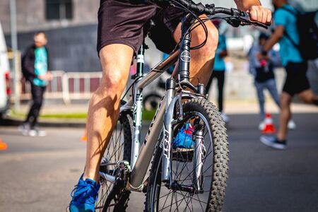 MOSCOW, RUSSIA - AUGUST 25, 2019: Ironman Cycling competition, cyclist athletes riding a race. Ironstar Crocus Fitness Triathlon.のeditorial素材