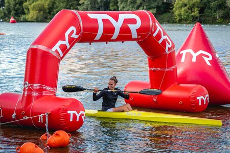 MOSCOW, RUSSIA - AUGUST 25, 2019: Young woman enjoys her kayak workout in the hot weather at Moscow river.のeditorial素材