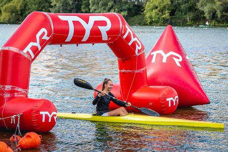 MOSCOW, RUSSIA - AUGUST 25, 2019: Young woman enjoys her kayak workout in the hot weather at Moscow river.のeditorial素材