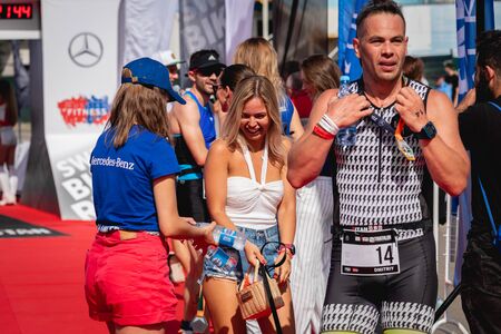 MOSCOW, RUSSIA - AUGUST 25, 2019: Finish line on Ironstar Crocus Fitness Triathlon 2019. Athlete, ironman, triathlon.のeditorial素材
