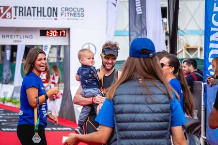 MOSCOW, RUSSIA - AUGUST 25, 2019: Finish line on Ironstar Crocus Fitness Triathlon 2019. Athlete, ironman, triathlon.のeditorial素材
