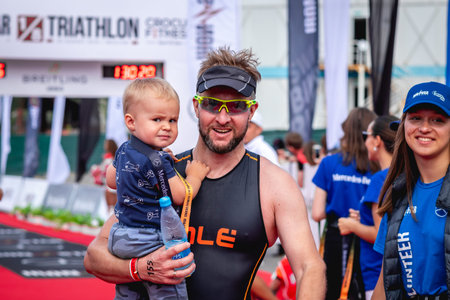 MOSCOW, RUSSIA - AUGUST 25, 2019: Finish line on Ironstar Crocus Fitness Triathlon 2019. Athlete,...