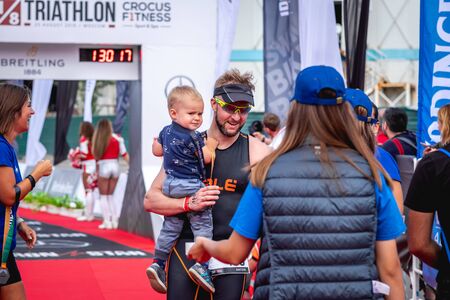 MOSCOW, RUSSIA - AUGUST 25, 2019: Finish line on Ironstar Crocus Fitness Triathlon 2019. Athlete, ironman, triathlon.のeditorial素材
