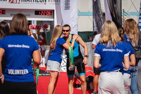 MOSCOW, RUSSIA - AUGUST 25, 2019: Finish line on Ironstar Crocus Fitness Triathlon 2019.のeditorial素材