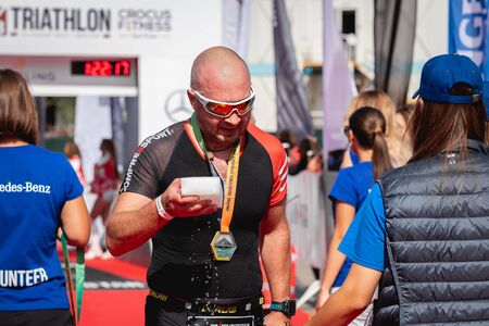 MOSCOW, RUSSIA - AUGUST 25, 2019: Finish line on Ironstar Crocus Fitness Triathlon 2019.のeditorial素材