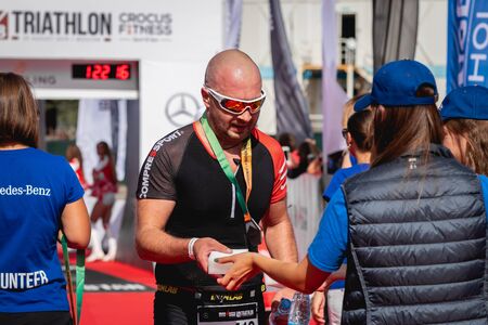 MOSCOW, RUSSIA - AUGUST 25, 2019: Finish line on Ironstar Crocus Fitness Triathlon 2019.のeditorial素材