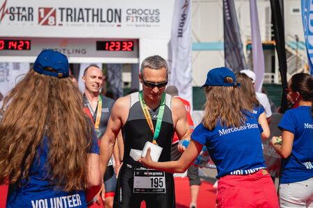 MOSCOW, RUSSIA - AUGUST 25, 2019: Finish line on Ironstar Crocus Fitness Triathlon 2019.のeditorial素材