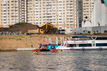 MOSCOW, RUSSIA - AUGUST 25, 2019: Ironman Swimmers on the motor ship, preparing to swim.のeditorial素材