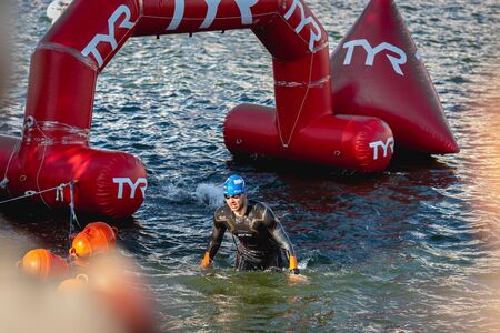 MOSCOW, RUSSIA - AUGUST 25, 2019: Ironman Swimmers on event. Ironstar Crocus Fitness Triathlon.のeditorial素材