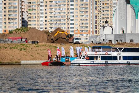 MOSCOW, RUSSIA - AUGUST 25, 2019: Ironman Swimmers on the motor ship, preparing to swim.のeditorial素材