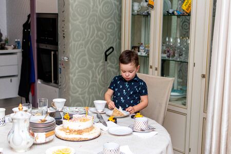 MOSCOW, RUSSIA - OCTOBER 12, 2019: Cute 3 years little boy and birthday cake.のeditorial素材