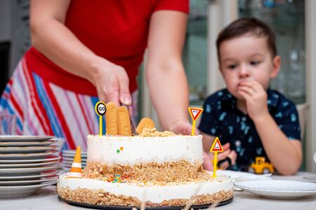 MOSCOW, RUSSIA - OCTOBER 12, 2019: Cute 3 years little boy and birthday cake.のeditorial素材