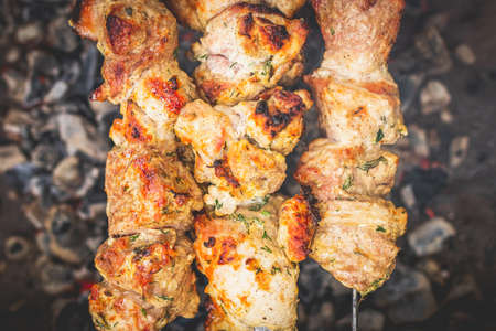 BBQ barbecuing skewers pork kebab, close up image. High quality photo.の写真素材