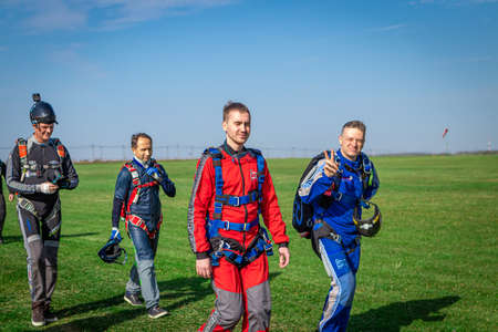 MOSCOW, RUSSIA - SEPTEMBER 27, 2020: Parachutists preparing for takeoff, walking to the aircraft.のeditorial素材