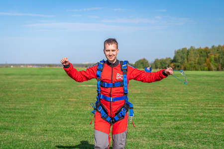 MOSCOW, RUSSIA - SEPTEMBER 27, 2020: Portrait of novice parachutist. Just landed for a first time.のeditorial素材