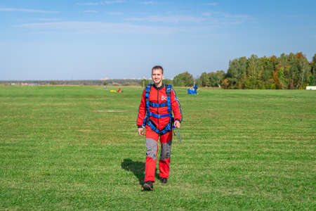 MOSCOW, RUSSIA - SEPTEMBER 27, 2020: Portrait of novice parachutist. Just landed for a first time.のeditorial素材