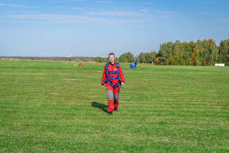 MOSCOW, RUSSIA - SEPTEMBER 27, 2020: Portrait of novice parachutist. Just landed for a first time.のeditorial素材