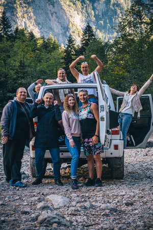 MOSCOW, RUSSIA - OCTOBER 25, 2020:Â Offroad group of tourist in jeep taking photos on a mountains background.のeditorial素材